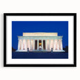 Colorful abstract art print of the Washington DC Lincoln Memorial, in vibrant hues on a textured canvas, framed in black.