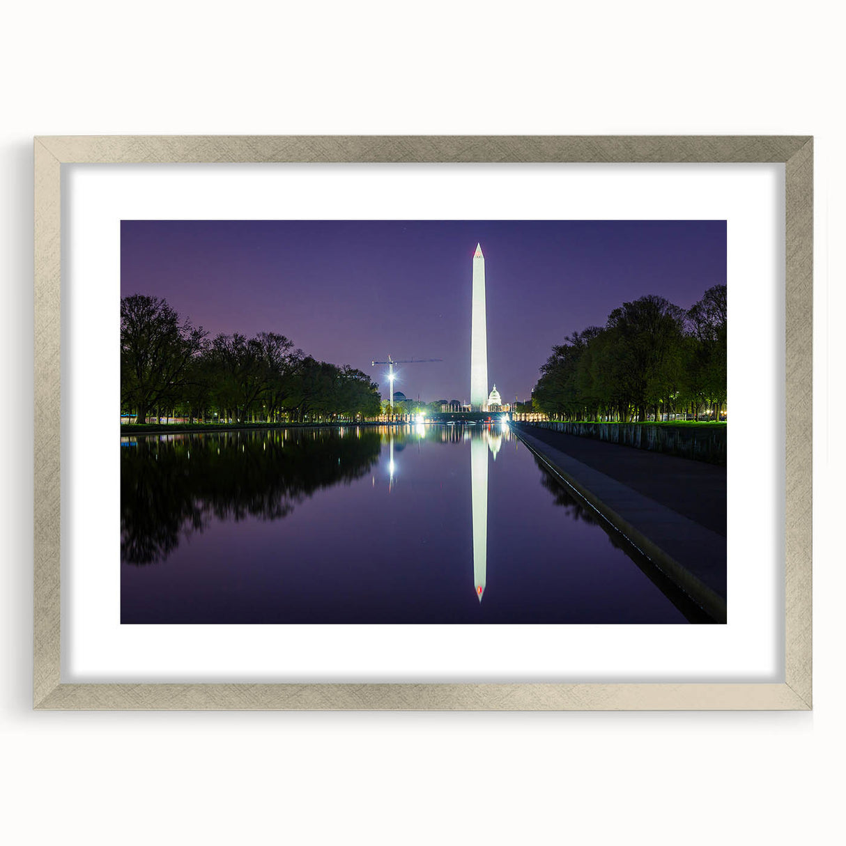 Textured art print depicting the Washington DC skyline in muted gray and silver tones, framed with a silver mat.