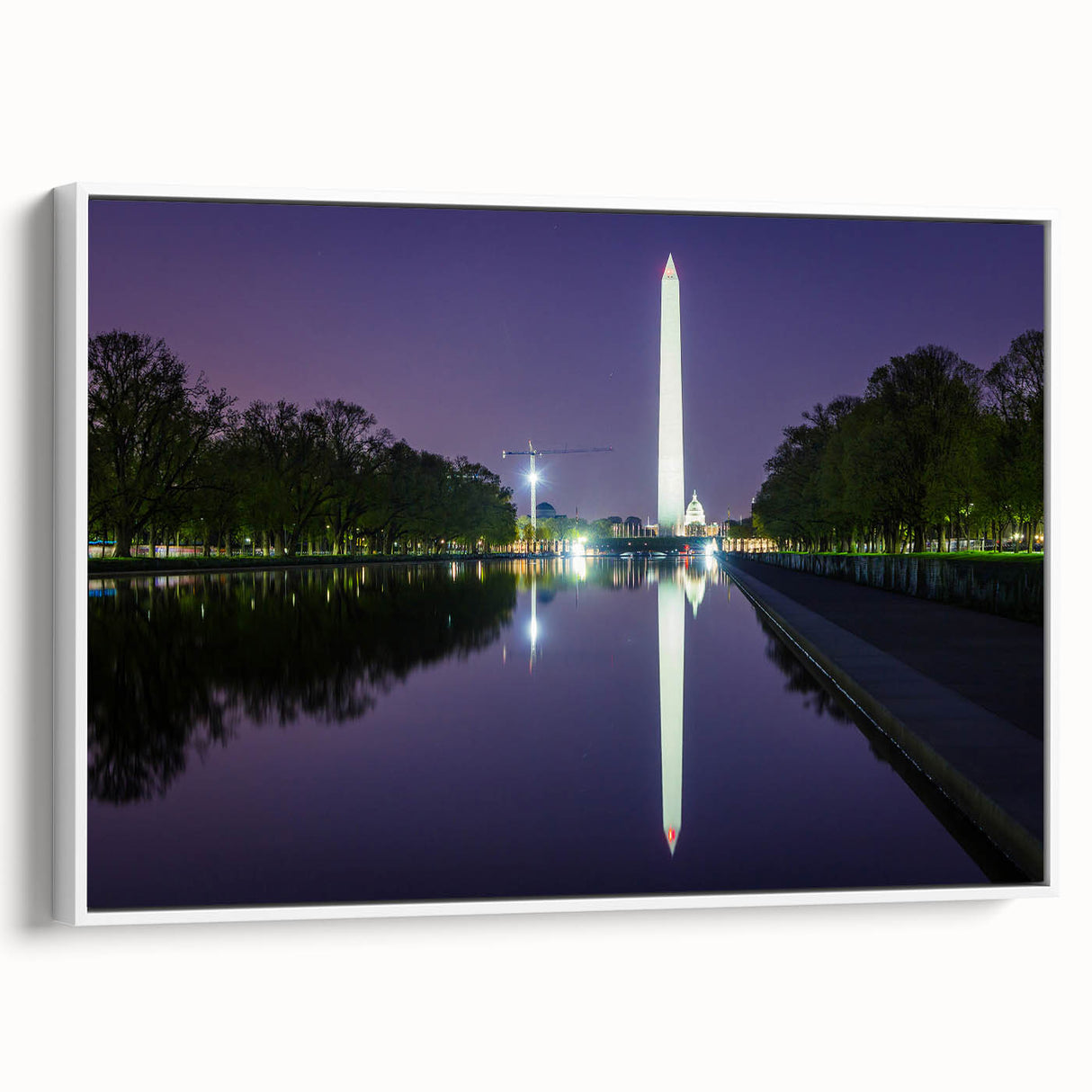 Vintage poster art of Washington DC monuments in muted colors on a large framed canvas, suitable for living room decor.