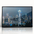 Large abstract wall art depicting the Seattle skyline in muted gray and blue tones, framed in black acrylic.