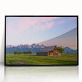 Large abstract wall art of Wyoming's Grand Tetons, framed in black acrylic, featuring muted earth tones.