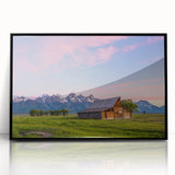 Large abstract wall art of Wyoming's Grand Tetons, framed in black acrylic, featuring muted earth tones.