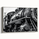 Framed canvas featuring a vintage poster of colorful, assorted vehicles in a landscape, ideal for an office or study room.