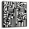 Abstract geometric framed canvas in black, showcasing bold shapes and lines, viewed from the side to highlight its depth and modern aesthetic, ideal for contemporary decor.