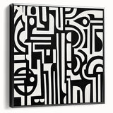 Abstract geometric framed canvas in black, showcasing bold shapes and lines, viewed from the side to highlight its depth and modern aesthetic, ideal for contemporary decor.