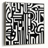 Abstract geometric framed canvas art in silver, showcasing intricate shapes and lines, perfect for modern home decor. Side view highlights the sleek frame and vibrant colors.
