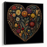 Framed canvas wall art showcasing a vibrant floral and botanical design with black accents, ideal for home decor. Side view highlights the frame's sleek profile.