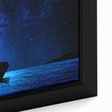 Extra large framed canvas featuring a textured depiction of a Mali scenery in black with colorful accents.