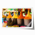 Rolled print of a Moroccan landscape featuring orange and teal hues, ideal for art wall dining room decor.