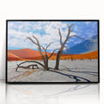 Large abstract wall art depicting a minimalistic Namibia scenery in muted earth tones, framed in black acrylic.