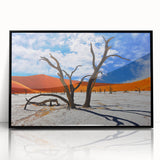 Large abstract wall art depicting a minimalistic Namibia scenery in muted earth tones, framed in black acrylic.
