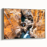 Framed canvas featuring a vintage-style landscape painting of a South African scenery in vibrant colors.