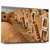 Large abstract wall art of Tunisian scenery in vibrant earth tones on acrylic glass.