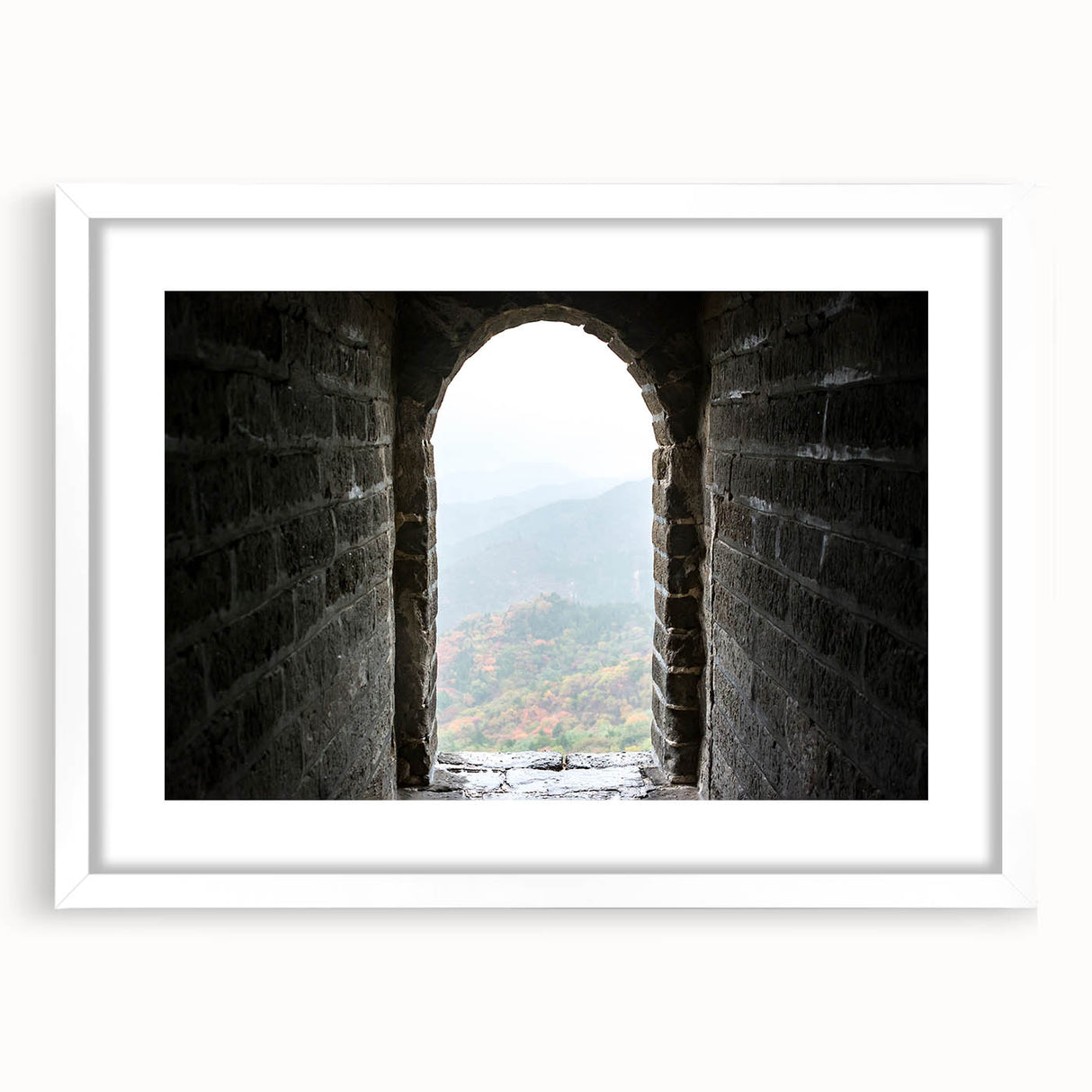 Abstract art print of the Great Wall of China in muted earth tones on a framed white canvas, suitable for dining room decor.