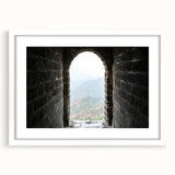 Abstract art print of the Great Wall of China in muted earth tones on a framed white canvas, suitable for dining room decor.