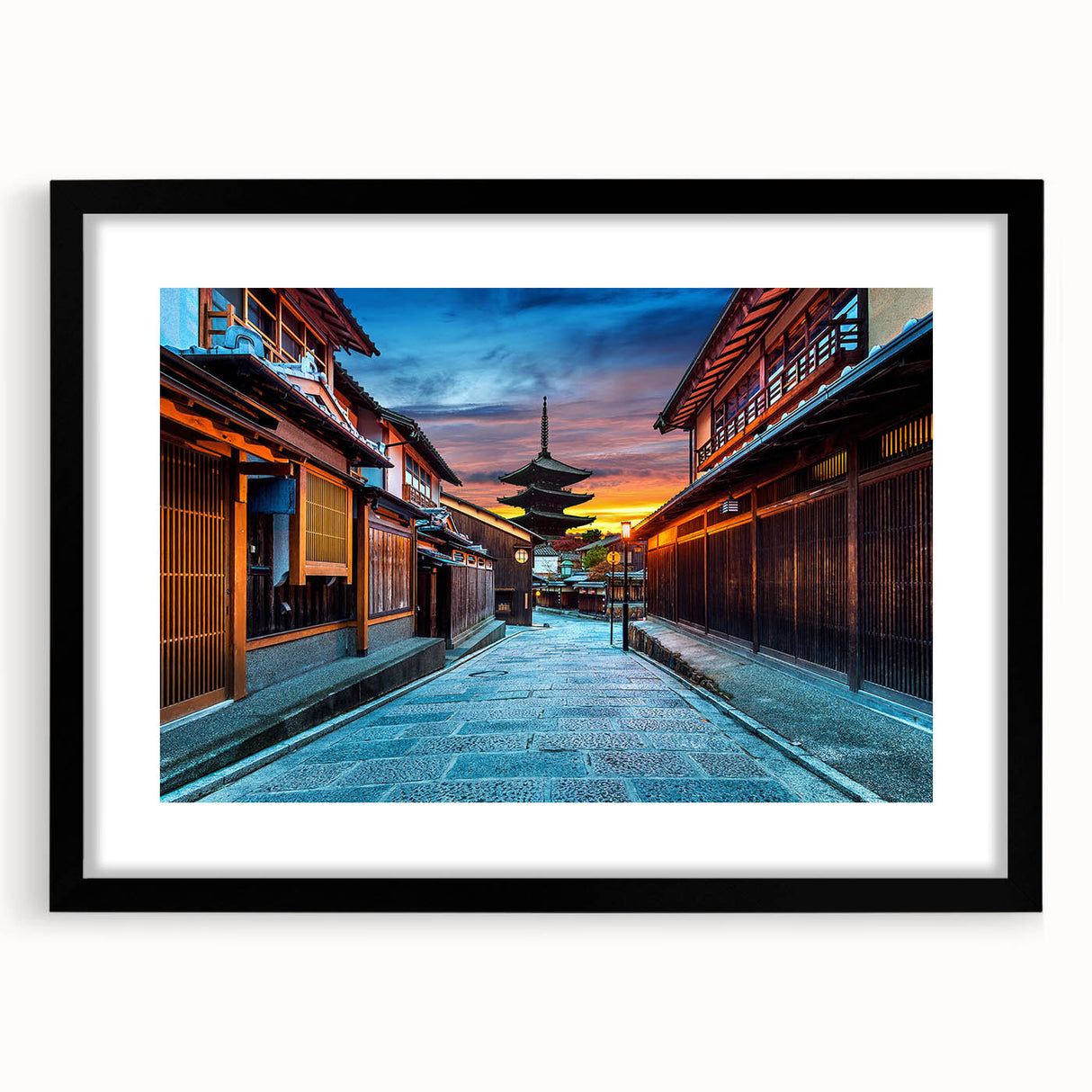 Colorful abstract art print of a stylized Japanese landscape in vibrant hues on a large framed canvas.