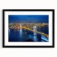 Extra large abstract art print of Tokyo skyline in vibrant, colorful hues on textured canvas, framed in black.
