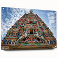 Large abstract wall art depicting a Malaysian landscape in vibrant greens and blues on acrylic glass.