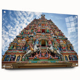 Large abstract wall art depicting a Malaysian landscape in vibrant greens and blues on acrylic glass.