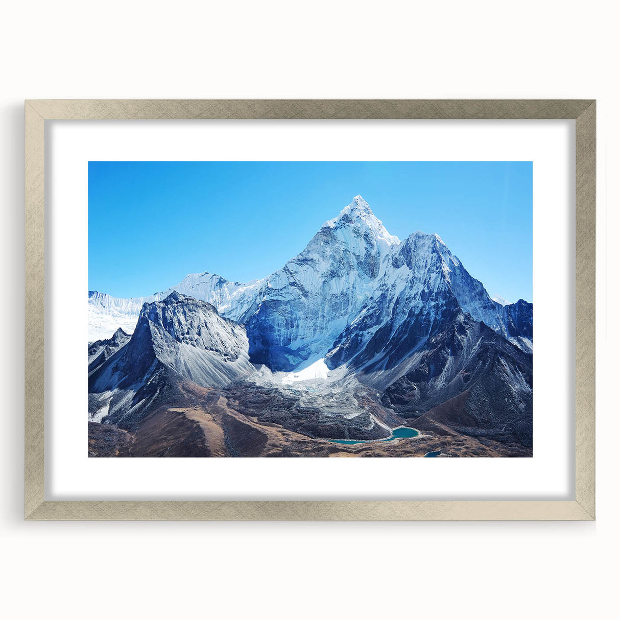 Textured art print of abstract Mount Everest scene in muted blue and gray tones on a silver-framed canvas.
