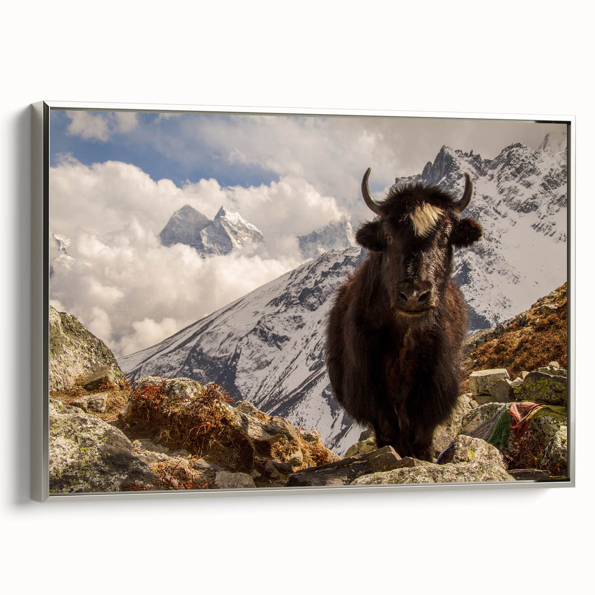 Framed canvas landscape art painting depicting a colorful Nepalese village scene.