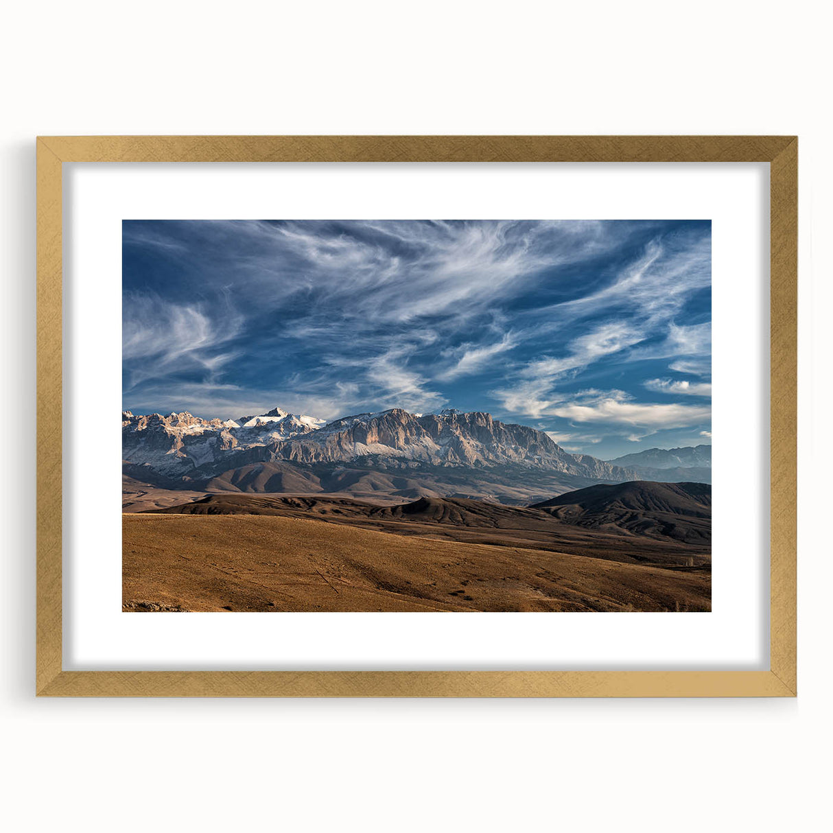 Extra large abstract art print depicting a textured Turkish landscape in muted earth tones, framed in gold.