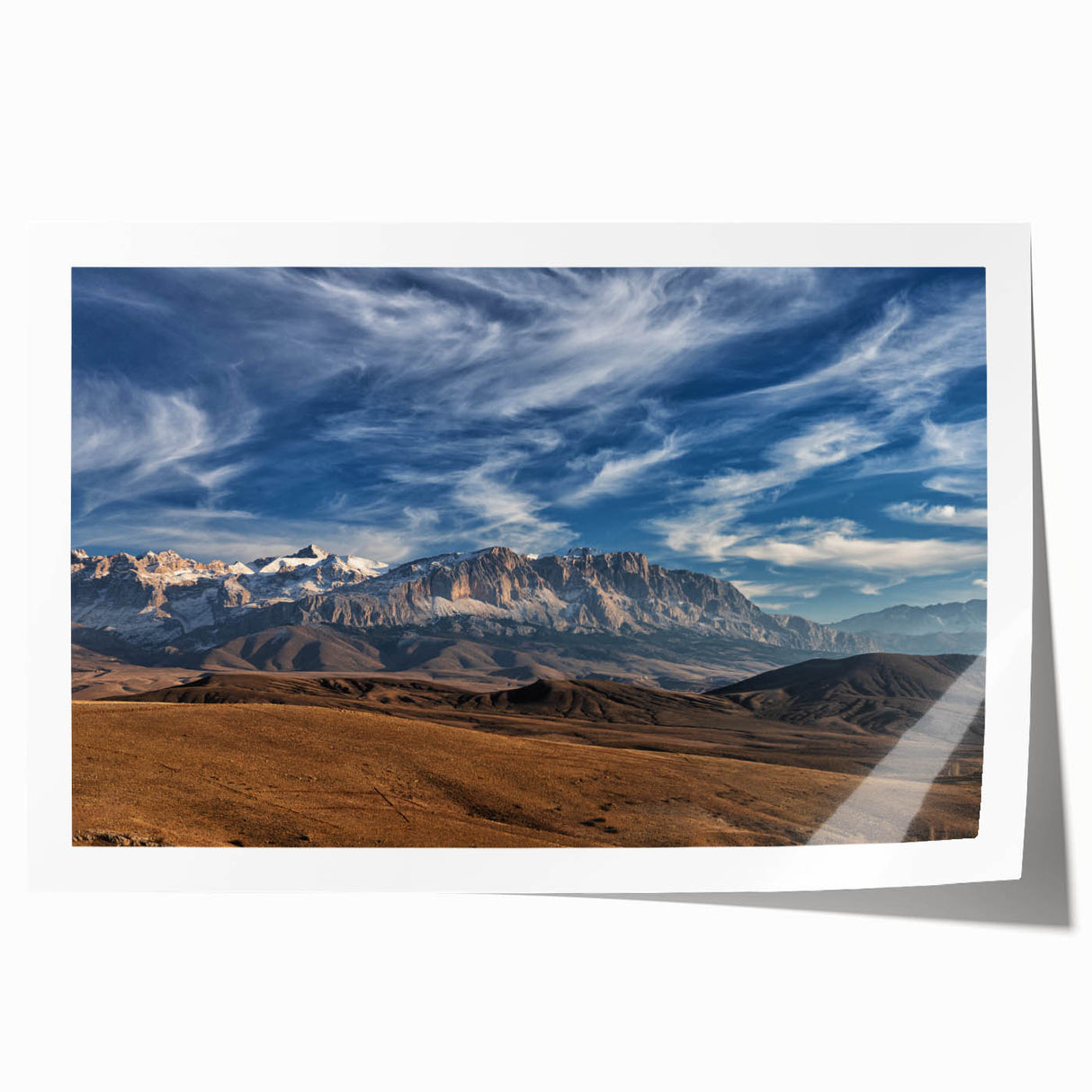 Extra large rolled print of a Turkish landscape featuring muted earth tones and floral elements.