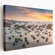 Side view of a stretched canvas featuring a serene Vietnamese landscape in muted green and blue tones.
