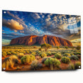 Large abstract depiction of Ayers Rock in muted orange and red tones on acrylic glass.