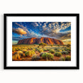 Extra large abstract art print of Ayers Rock with vibrant, textured colors on a framed black mat.