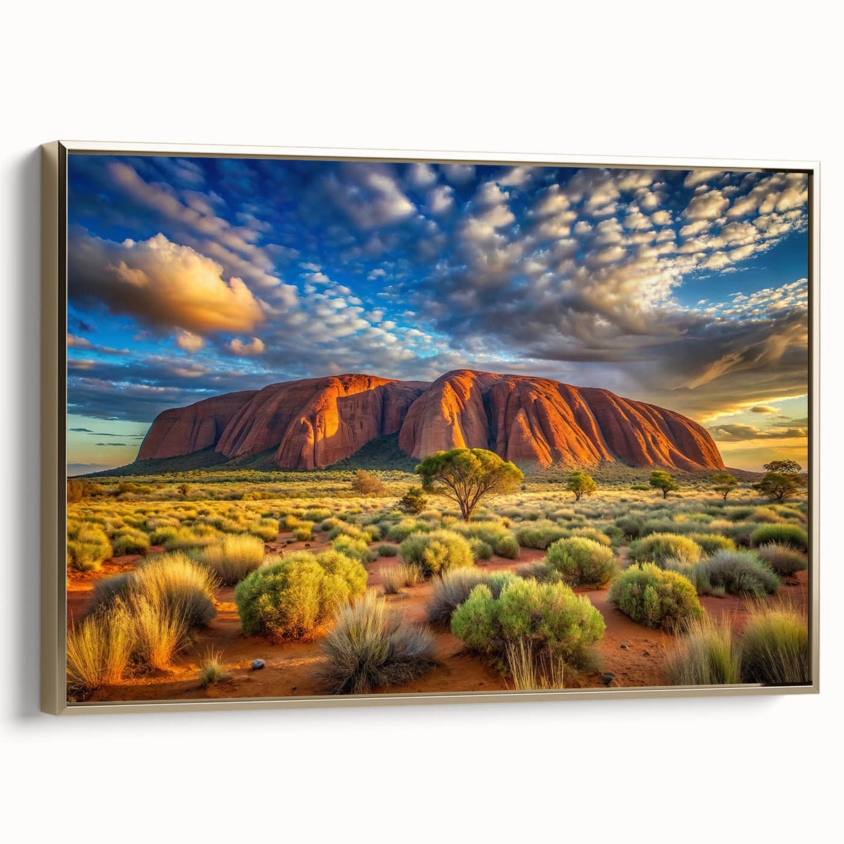 Framed canvas landscape art painting of Ayers Rock in Australia, featuring earthy red and orange tones.
