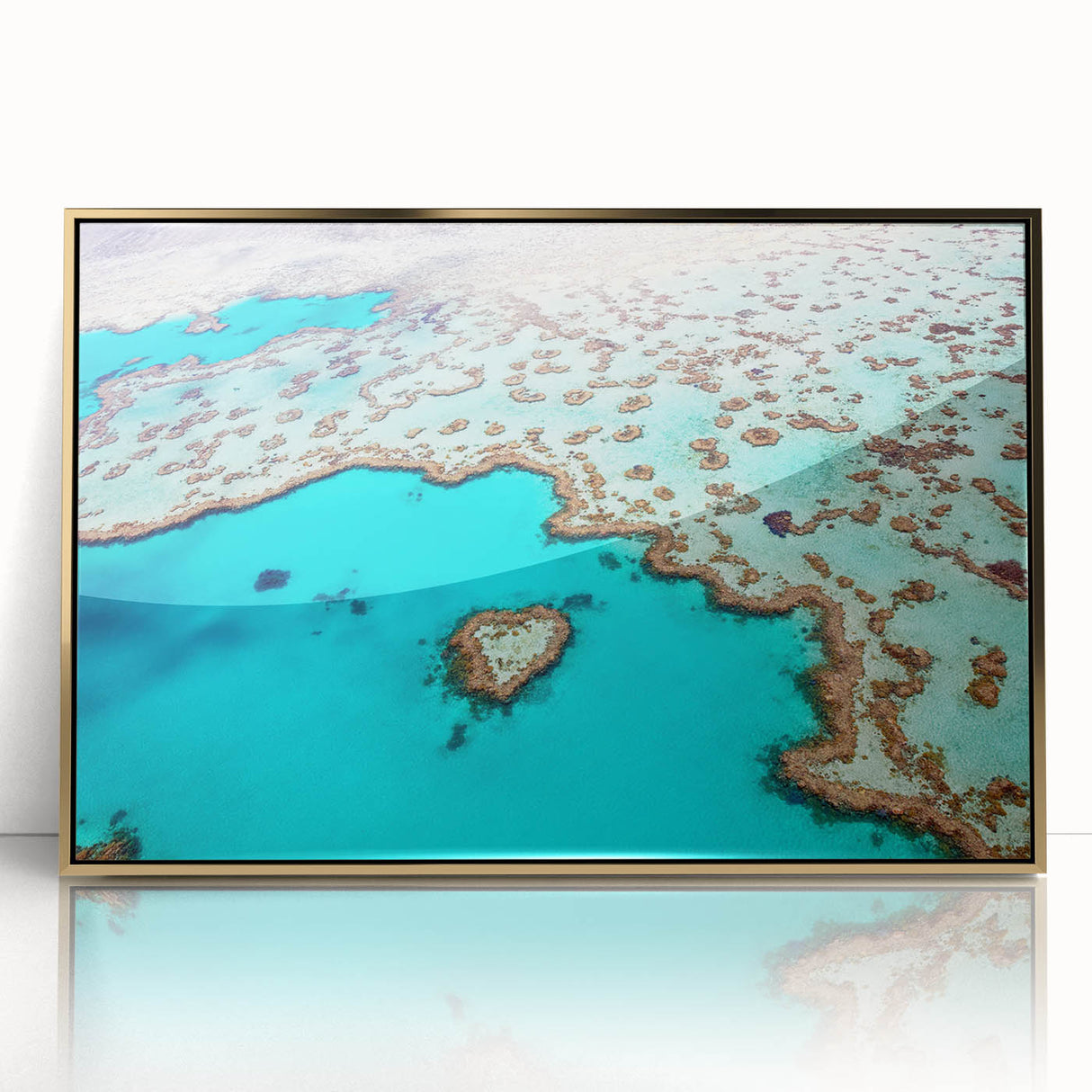 Mid-century modernist art depicting the Great Barrier Reef in vibrant blues and greens on a framed acrylic.