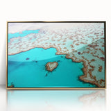 Mid-century modernist art depicting the Great Barrier Reef in vibrant blues and greens on a framed acrylic.
