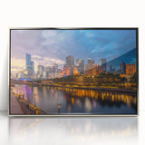 Art deco poster of Melbourne skyline in silver framed acrylic, suited for modern nursery decor.