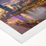 Art deco poster of Melbourne skyline in pastel hues on rolled canvas, suitable for dining room wall art.