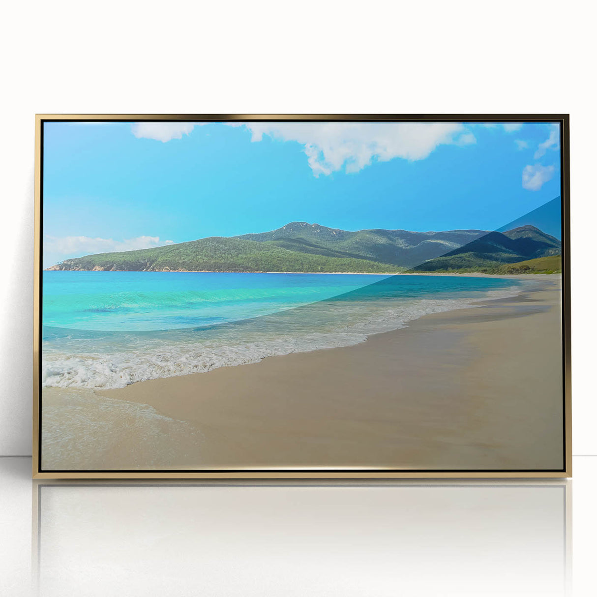 Art deco poster of Tasmania scenery in gold acrylic frame, with soft blue and green palette.