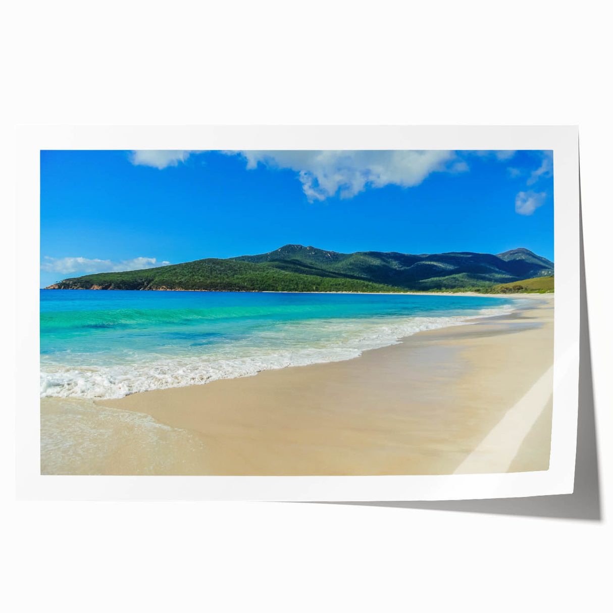 Rolled print of a Tasmanian landscape featuring vibrant greenery and muted sky, ideal for dining room wall art.