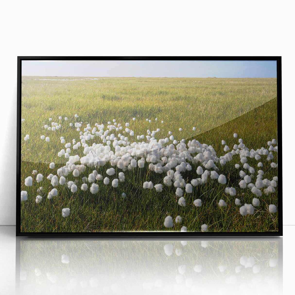 Large abstract wall art depicting the Northwest Territories in muted earth tones, framed in black acrylic.