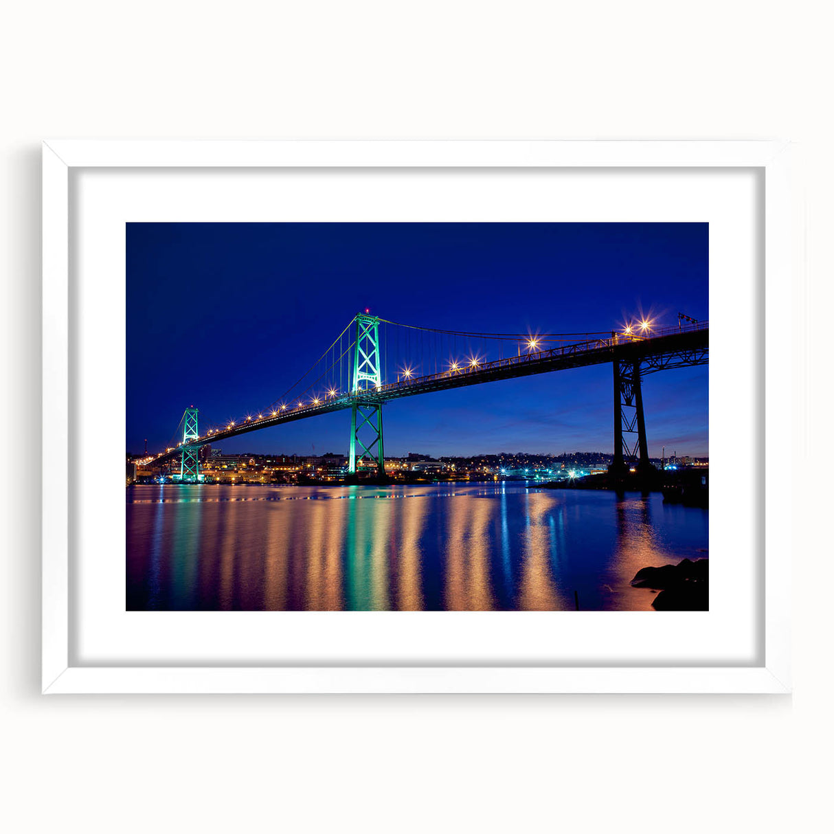 Abstract art print of Nova Scotia scenery in muted blues and greens on a framed white mat, ideal for dining room decor.