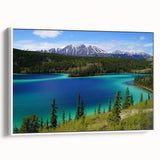 Framed canvas of a vintage poster art depicting Yukon scenery in vibrant colors, ideal for living room decor.