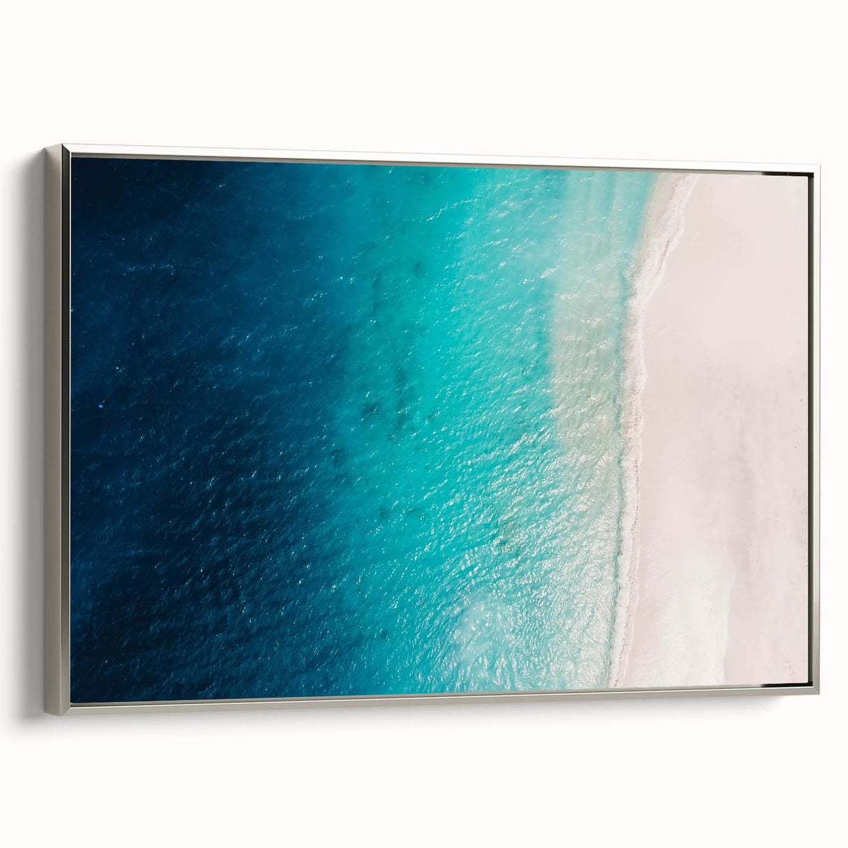 Framed canvas of a vintage-style Caribbean landscape with vibrant blue and green tones, ideal for living room decor.