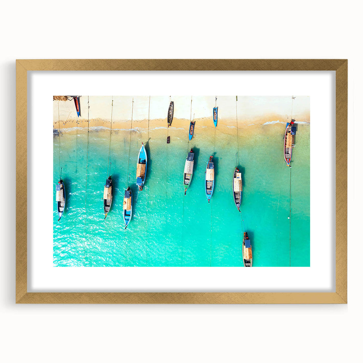 Abstract art print of a Caribbean scenery in muted blue and green tones on a framed gold mat, suitable for dining room decor.