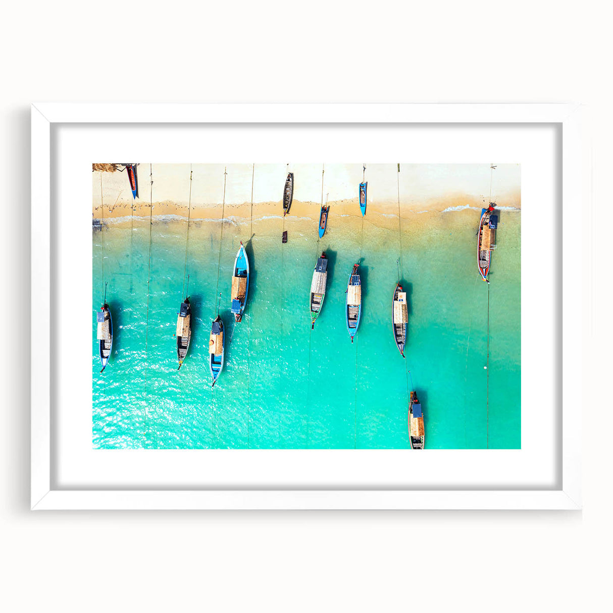 Textured abstract art print of a Caribbean scene in muted blue and green tones, framed with a white mat.