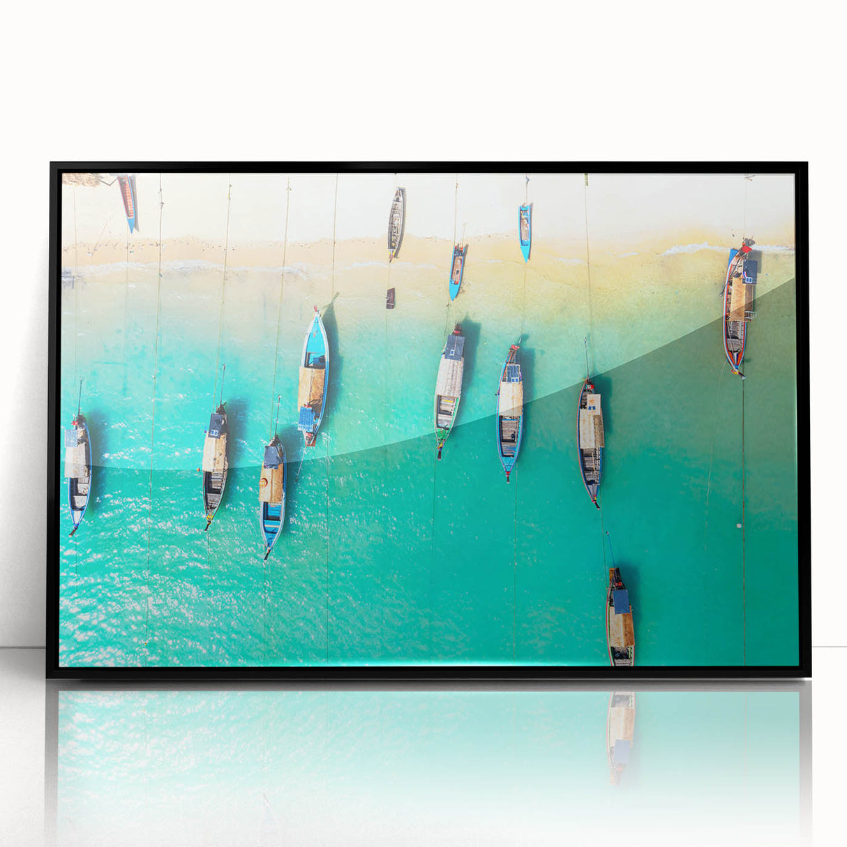 Large abstract wall art depicting a serene Caribbean scene in muted blues and greens, framed in black acrylic.