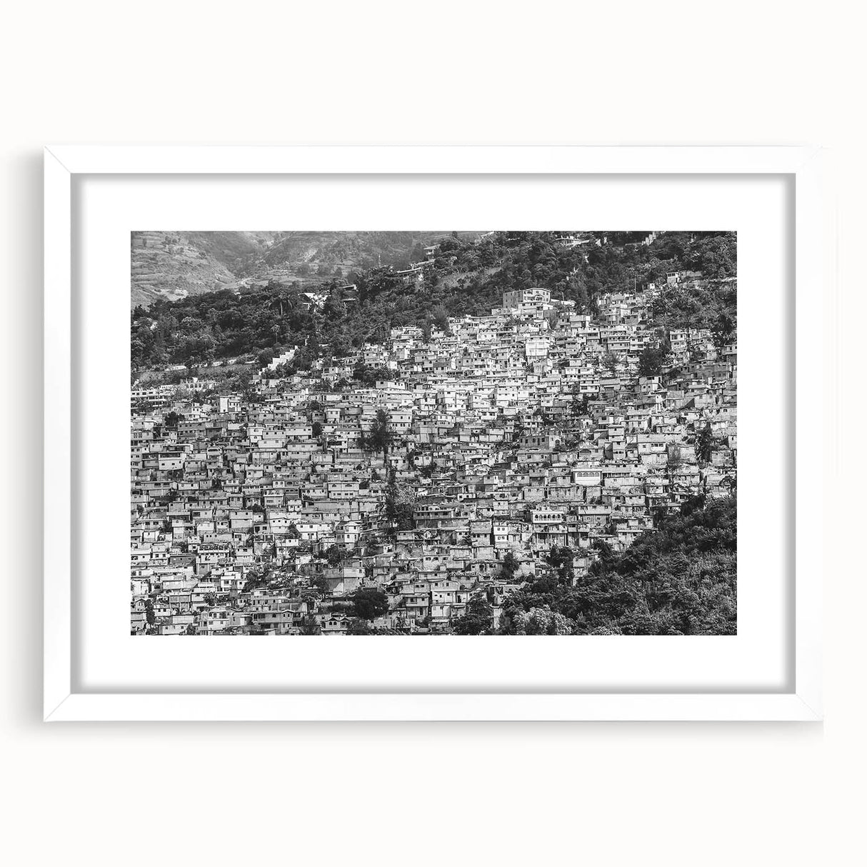 Textured abstract art print of Caribbean scenery in muted blue and green shades on a framed white mat.