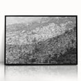 Large abstract wall art featuring Caribbean scenery in muted blues and greens, framed in black acrylic.