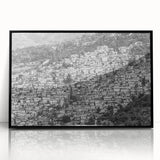 Large abstract wall art featuring Caribbean scenery in muted blues and greens, framed in black acrylic.
