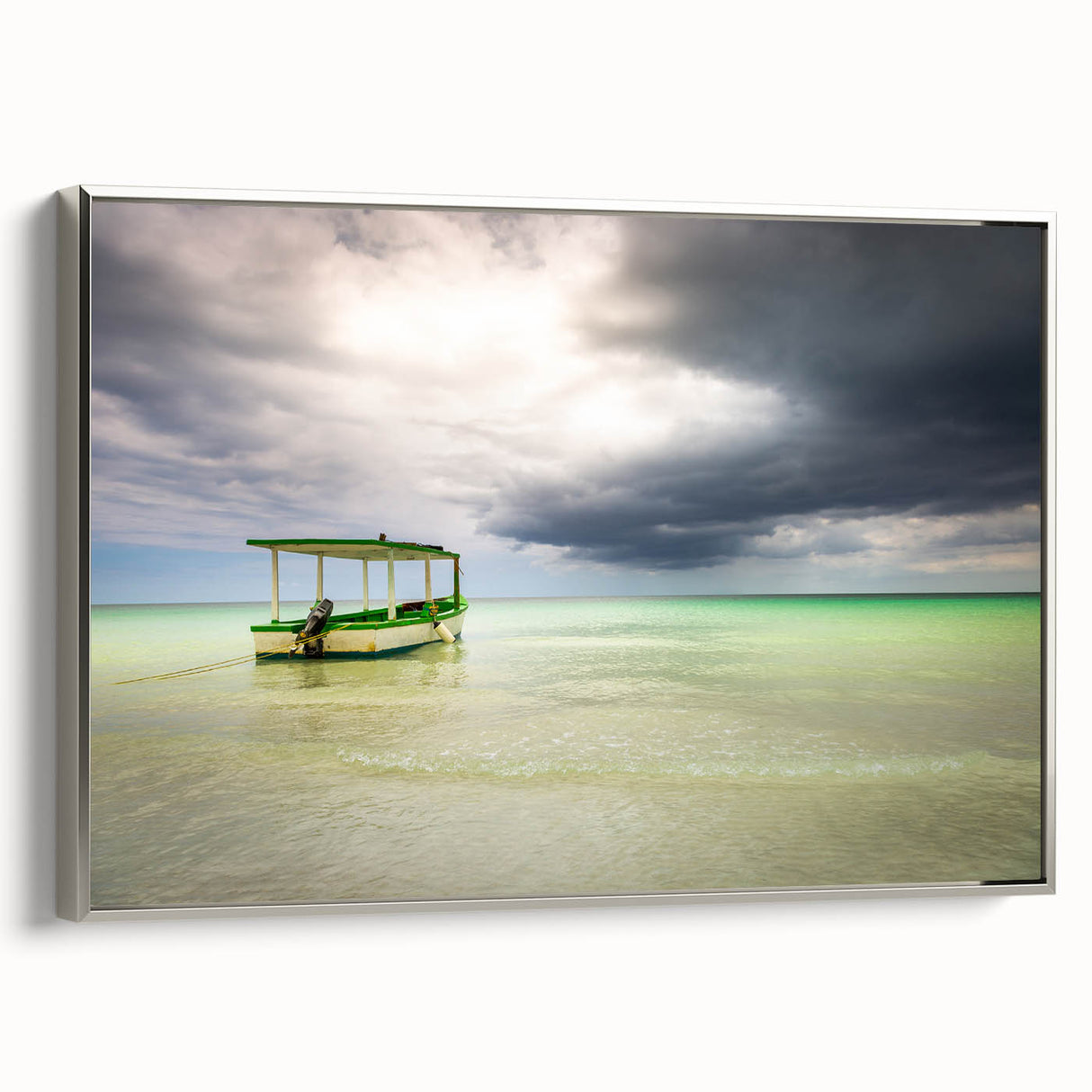 Framed canvas featuring a vintage-style landscape painting of the Caribbean with muted blue and green tones.