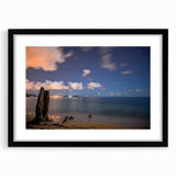 Abstract art print of a Caribbean scene in vibrant colors on a textured, framed canvas, ideal for living room decor.