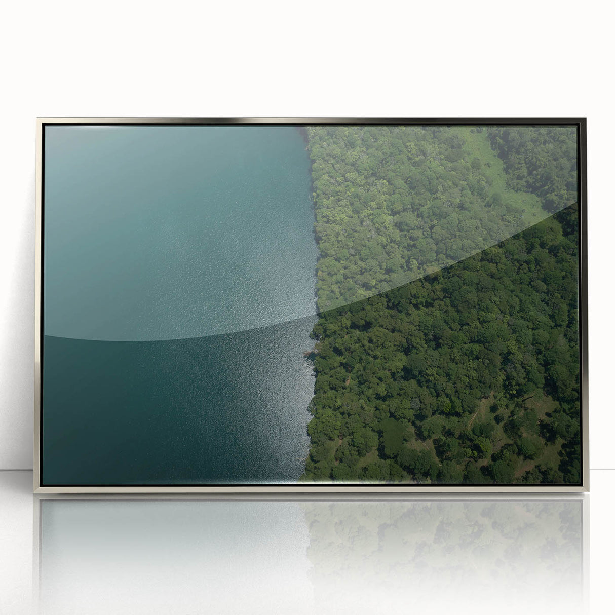 Mid-century modernist art featuring a serene Costa Rican landscape in muted earth tones, framed in silver acrylic.